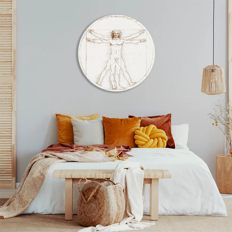 Tableau forme circulaire l'Homme de Vitruve de Léonard de Vinci dans une chambre