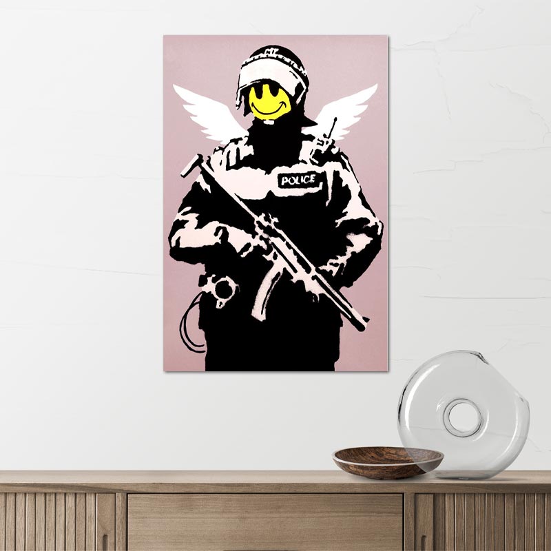 Tableau Banksy "Flying Copper" - TabloDéco.fr