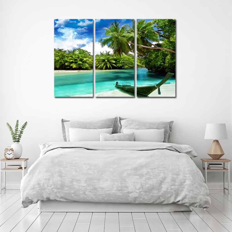 Tableau sur toile imprimée en 3 parties d'un Bateau sur la Plage