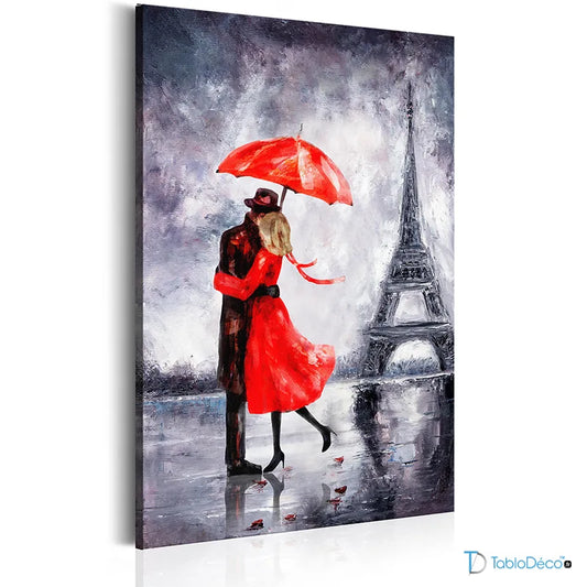 Tableau Amour à Paris d'un couple avec un parapluie rouge devant la Tour Eiffel