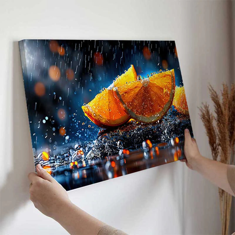 Tableau sur toile de Tranches d’Orange et Gouttes d’eau accroché dans une cuisine