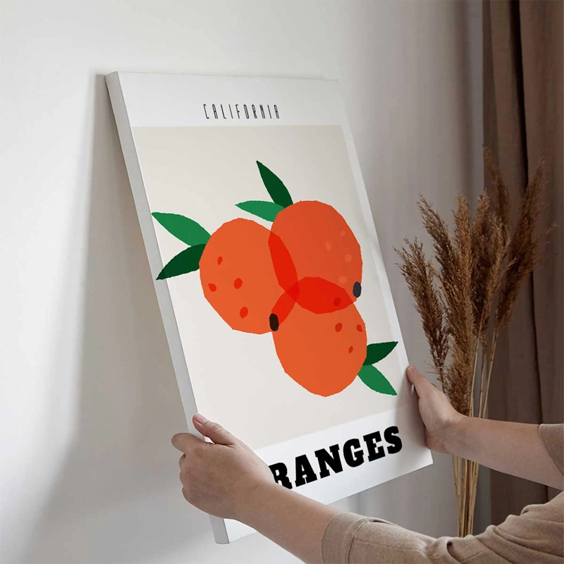 Tableau sur toile Vintage Oranges California accroché dans une cuisine